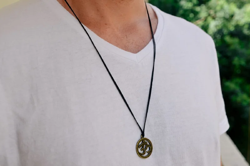 Men's necklace with a bronze Om pendant, black cord, yoga jewelry for man, handmade, gift wrapped