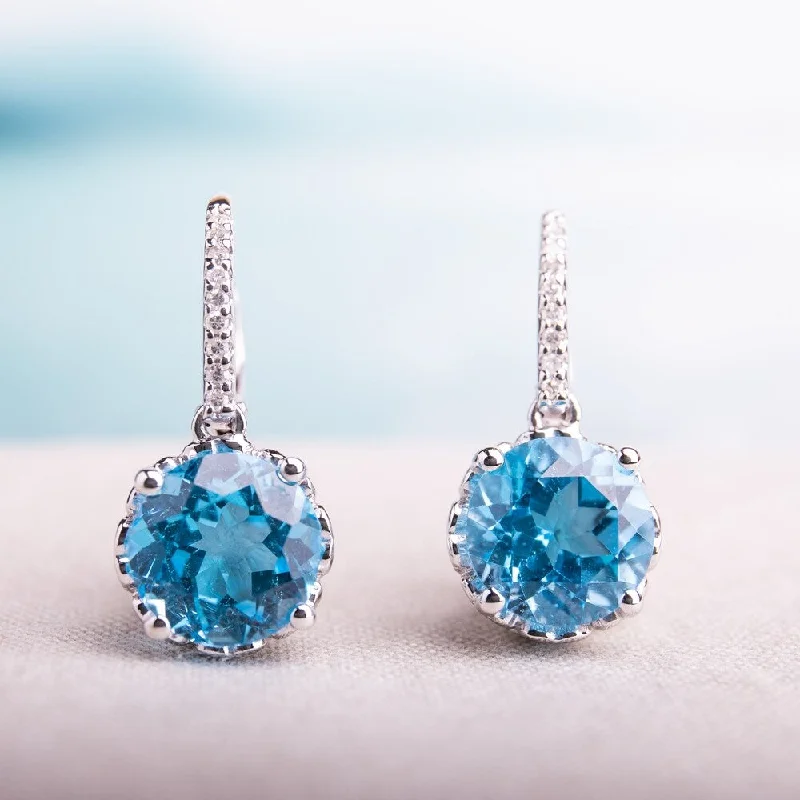 bold opal ridge earrings-Miadora 10k White Gold Blue Topaz and 1/10ct TDW Diamond Earrings (G-H, I2-I3)